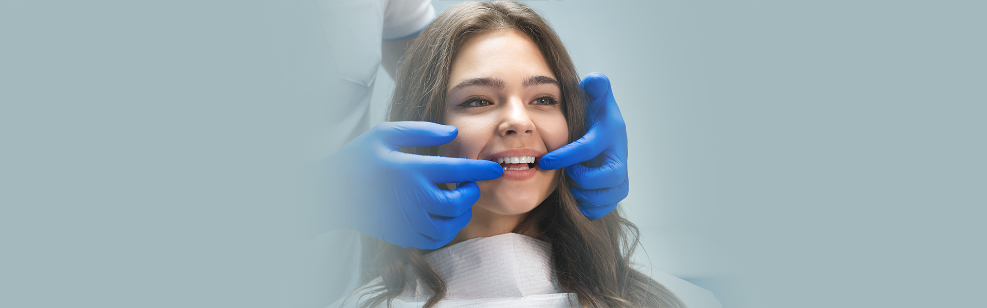 Dental patient learning how to maintain her dental veneers at Waterdown Smiles Dentistry.
