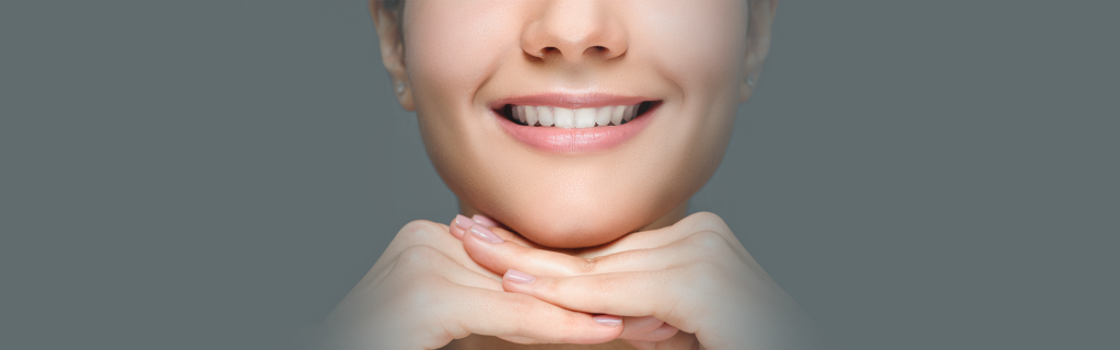 Dental patient after getting teeth whitening treatment.